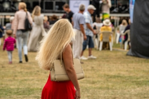 woman at outdoor event How to Dress for Outdoor Events this Spring