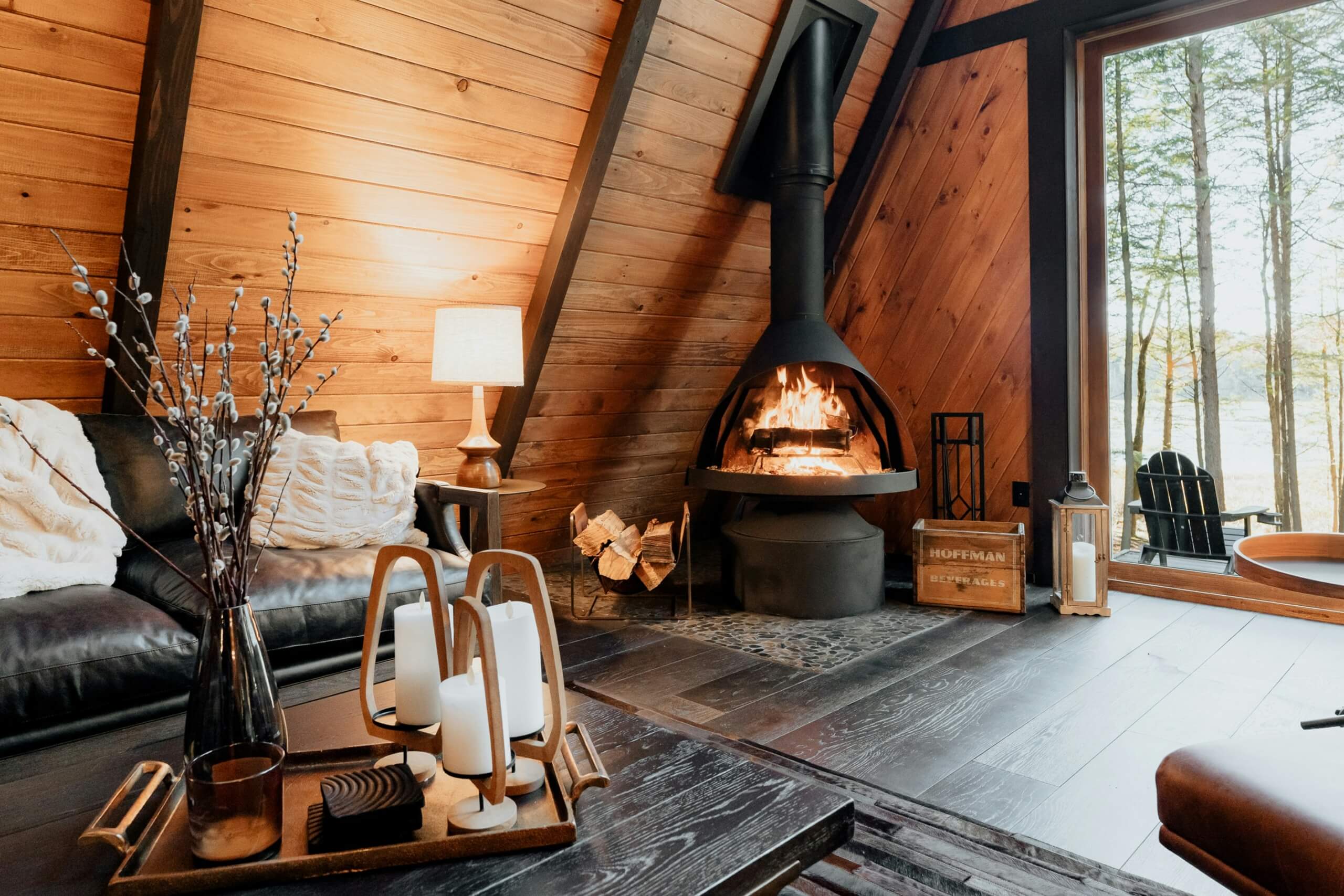 cozy living room Photo by <a href="https://unsplash.com/@claybanks?utm_source=unsplash&utm_medium=referral&utm_content=creditCopyText">Clay Banks</a> on <a href="https://unsplash.com/photos/a-living-room-with-a-fire-place-inside-of-it-f_6yPIgDxxs?utm_source=unsplash&utm_medium=referral&utm_content=creditCopyText">Unsplash</a> 