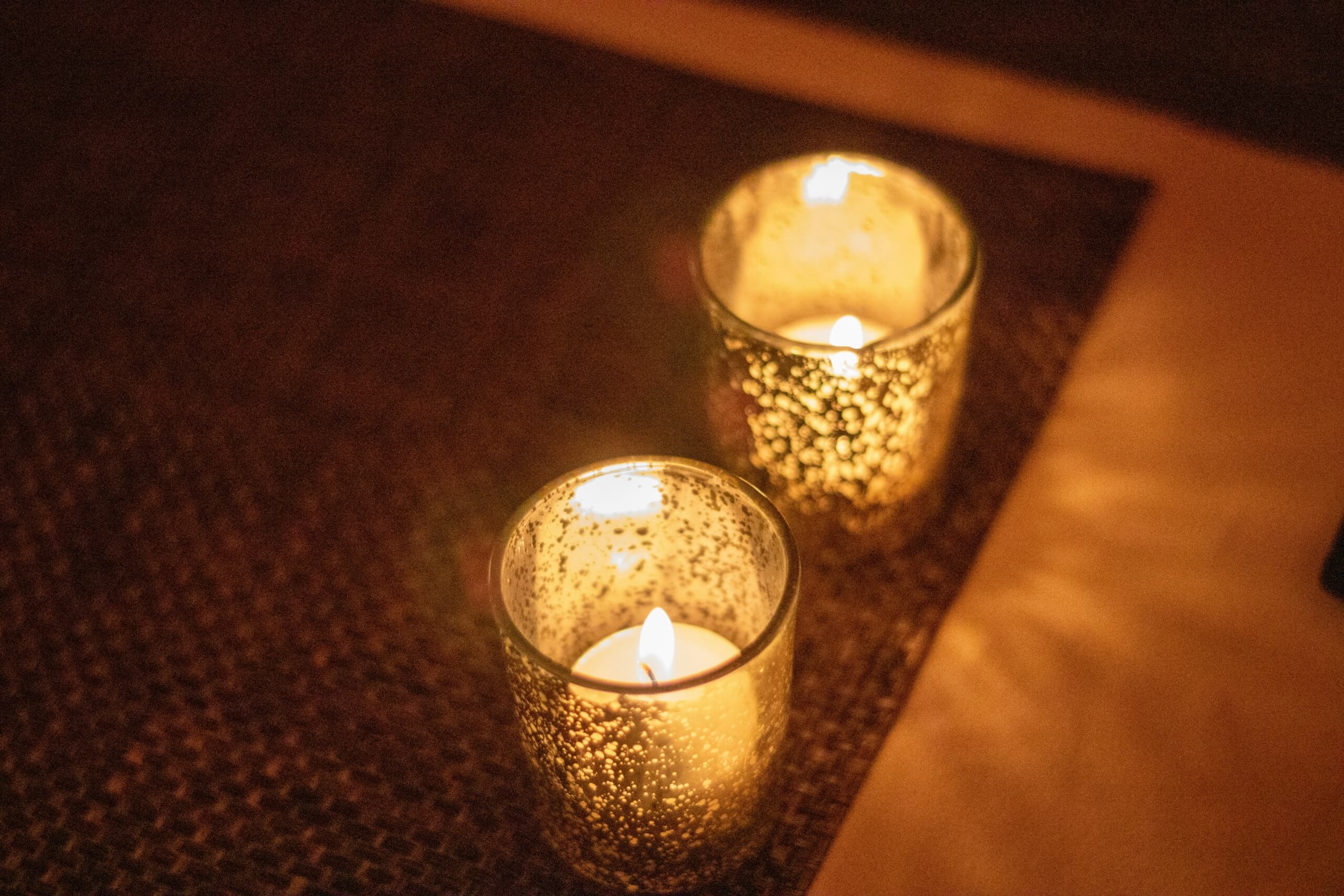 candles burning Photo by <a href="https://unsplash.com/@sarahreneewolfe?utm_source=unsplash&utm_medium=referral&utm_content=creditCopyText">Sarah Wolfe</a> on <a href="https://unsplash.com/photos/two-white-tealight-candles-dztw-vaPDYY?utm_source=unsplash&utm_medium=referral&utm_content=creditCopyText">Unsplash</a> 