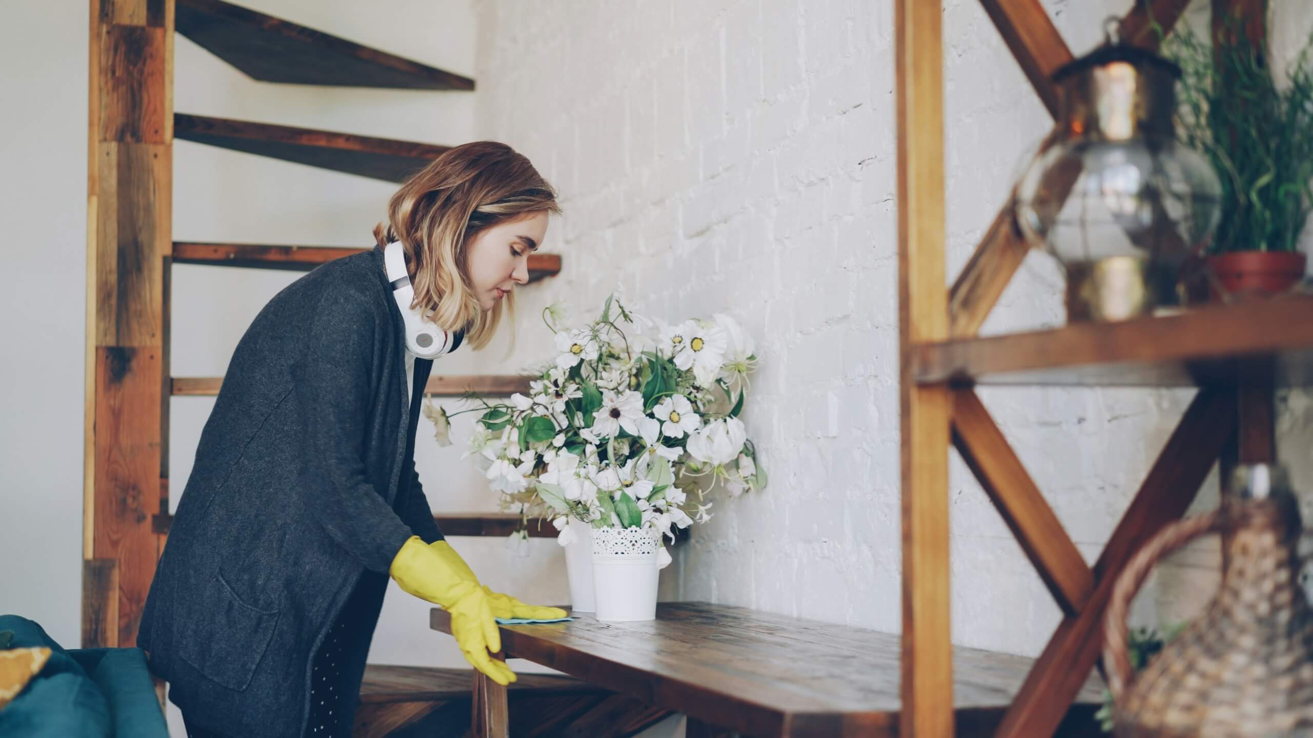 woman cleaning spring cleaning motivation hacks