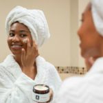 woman doing skincare anti-aging trends