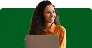 ways to file taxes smiling woman doing taxes