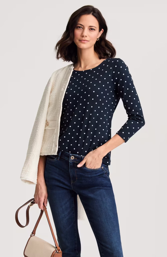 Woman wearing polka dot shirt french girl style