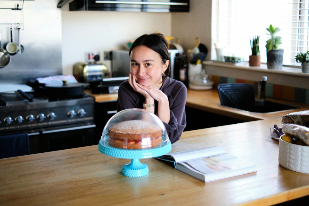 woman baking a cake simple new hobbies for women