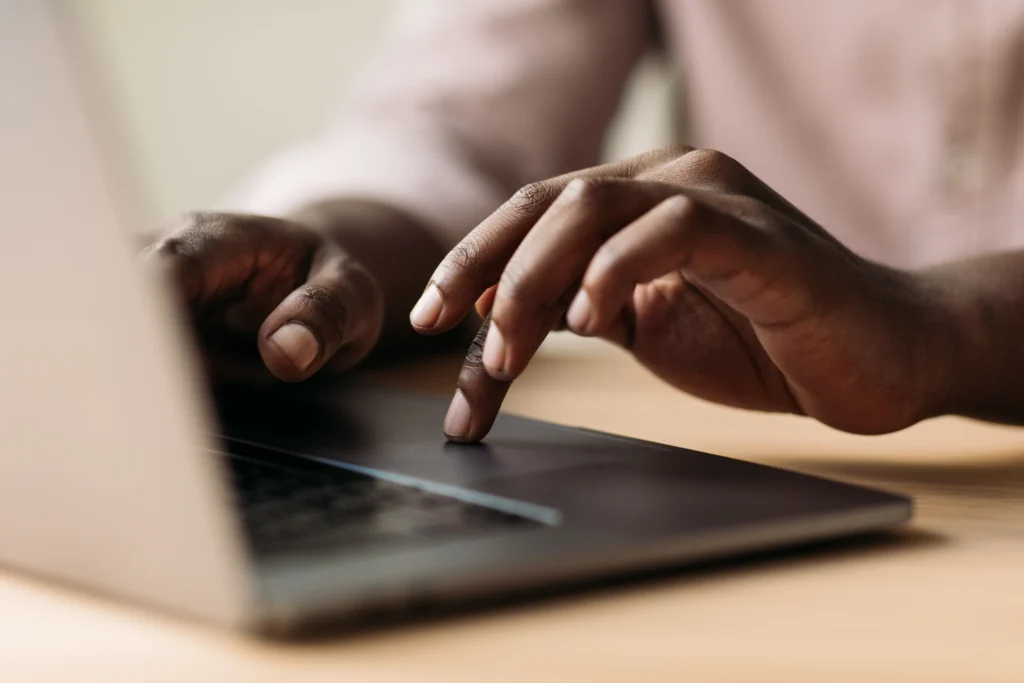 woman booking an appt on her phone 
