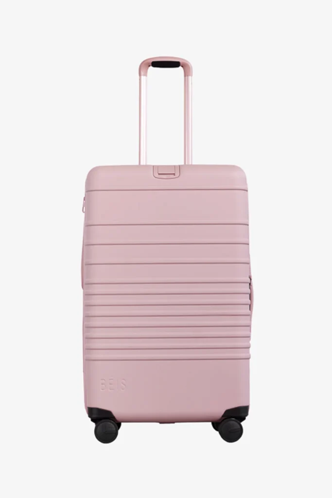 The Medium Check-In Roller in Atlas Pink cruise packing list first time