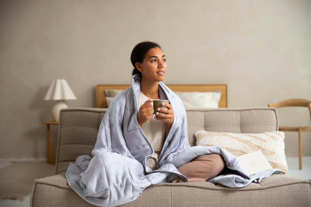 woman relaxing cozy night blanket 