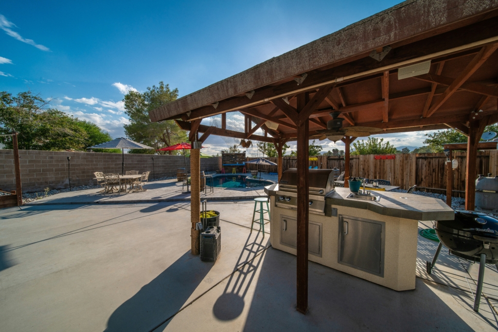 Outdoor kitchen with pool area backyard kitchen outdoor kitchen patio