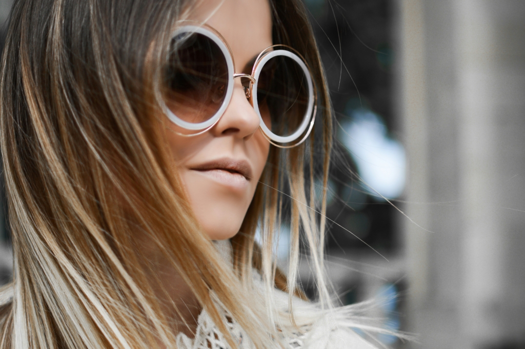 clean girl summer outfits woman with sunglasses on