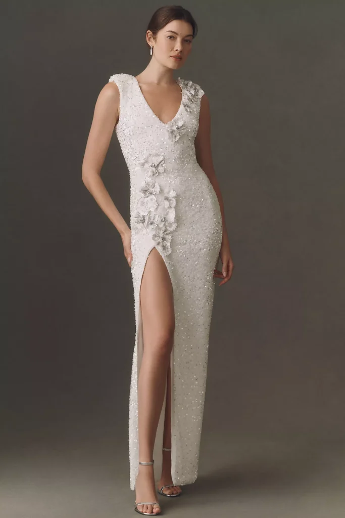 Elegant white dress with floral accents wedding dress trends 2026