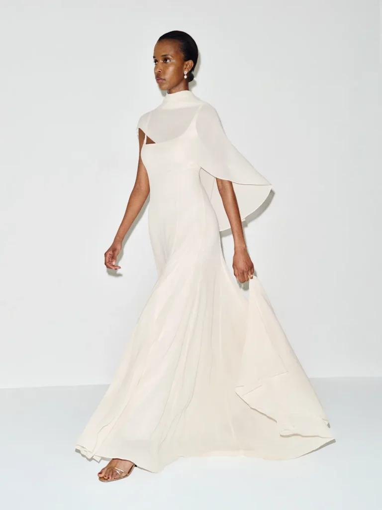 Elegant woman in flowing white dress Sirinda Dress
wedding dress trends 2026