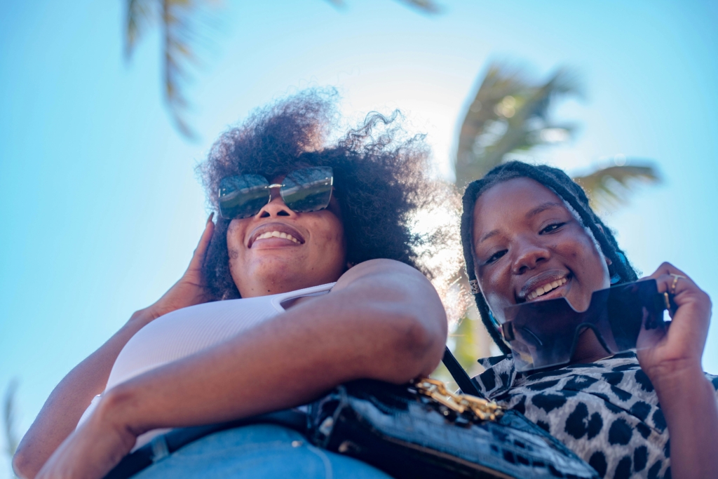 friends at the beach best islands for a girls trip