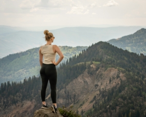 woman outdoors outside hiking nature Outdoorsy Capsule Wardrobe