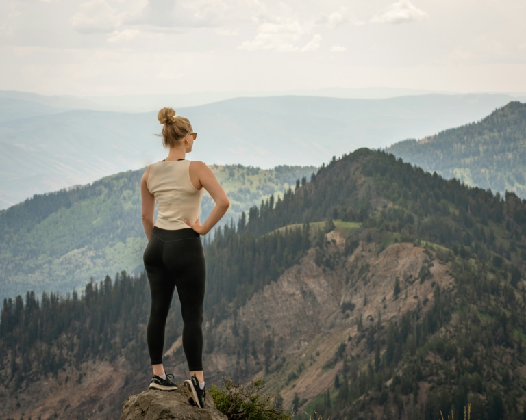 woman outdoors outside hiking nature Outdoorsy Capsule Wardrobe