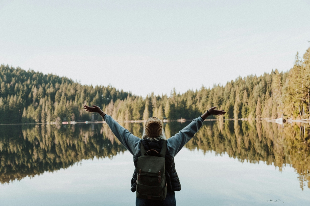 woman hiking outdoors natures woman outside outdoorsy capsule wardrobe