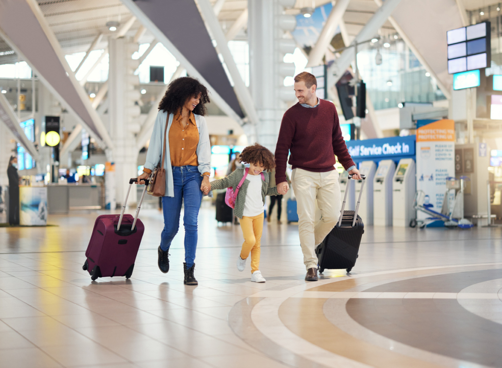 Family, holding hands at airport and travel with suitcase parents and child walking, ready for vacation and flight. Trust, adventure and people together at airline, transportation and journey family holiday travel tips