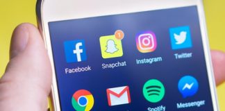 Person Holding Turned-on Android Smartphone - Remote Social Media Jobs