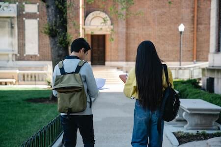 Man and Woman Walking on Pavement - how to recruit college students