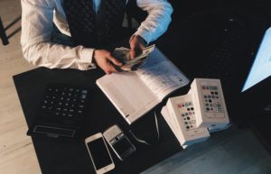 Accountant Counting Money - work from home accounting jobs