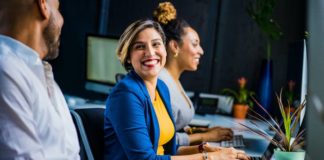 Woman in Blue Suit Jacket - how to get interns
