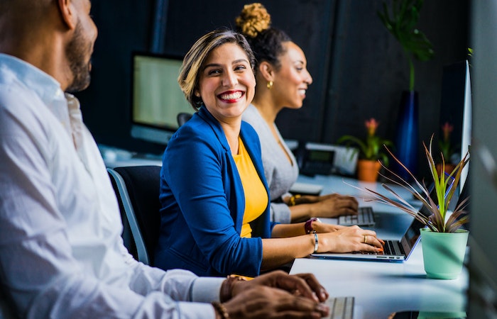 Woman in Blue Suit Jacket - how to get interns