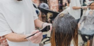 Person Holding Black Brush - salon jobs near me