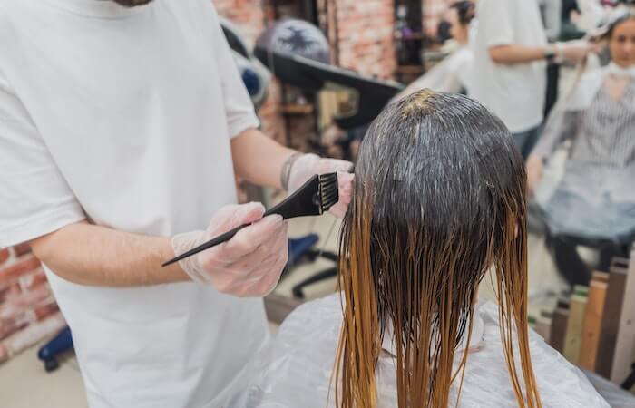 Person Holding Black Brush - salon jobs near me