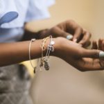 elective Focus Photography of Person Wearing Three Bangles - jewelry holiday gift guide