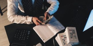 Accountant Counting Money - entry level accounting jobs