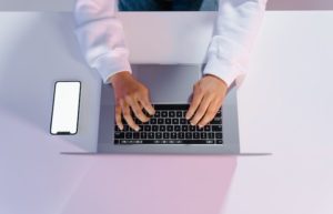 erson in White Long Sleeve Shirt Using Laptop - good cover letter examples