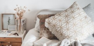 White and Brown Throw Pillow on White Bed - winter home decor