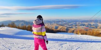 Person Snowboarding on Field - ski outfits for women