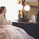 Woman Wearing Gown Looking at Mirror - spring formal dresses