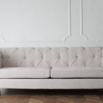 Photo Of White Couch On Wooden Floor - white modern couch