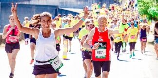 Female and Male Runners on a Marathon - best running accesories