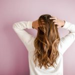 Woman Wearing White Long-sleeved Shirt - self care gifts for Mother's Day