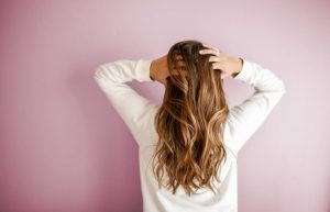 Woman Wearing White Long-sleeved Shirt - self care gifts for Mother's Day