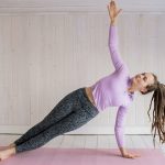 Woman In Pink Long Sleeve Shirt And Gray Leggings Doing Yoga - pilates classes for beginners
