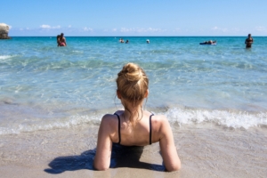 woman on the beach beach hairstyles that last beach wave hair