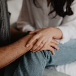 Woman Holding Man's Hand - engagement photo outfits