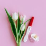flowers, pregnancy test, and binky - 100 percent accurate ovulation calculator
