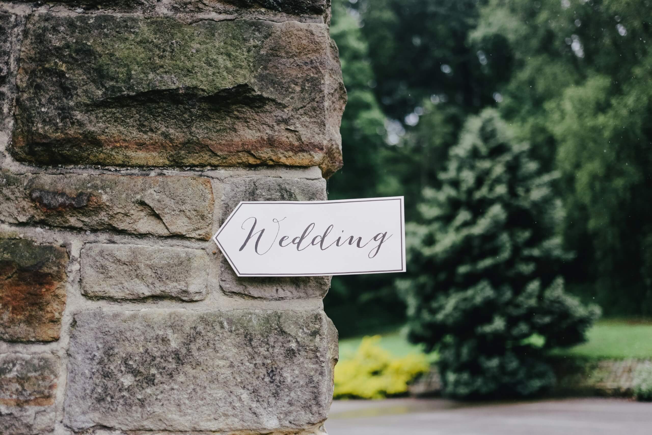 cohesive wedding look - wedding sign