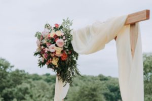 cohesive wedding looks - wedding arch