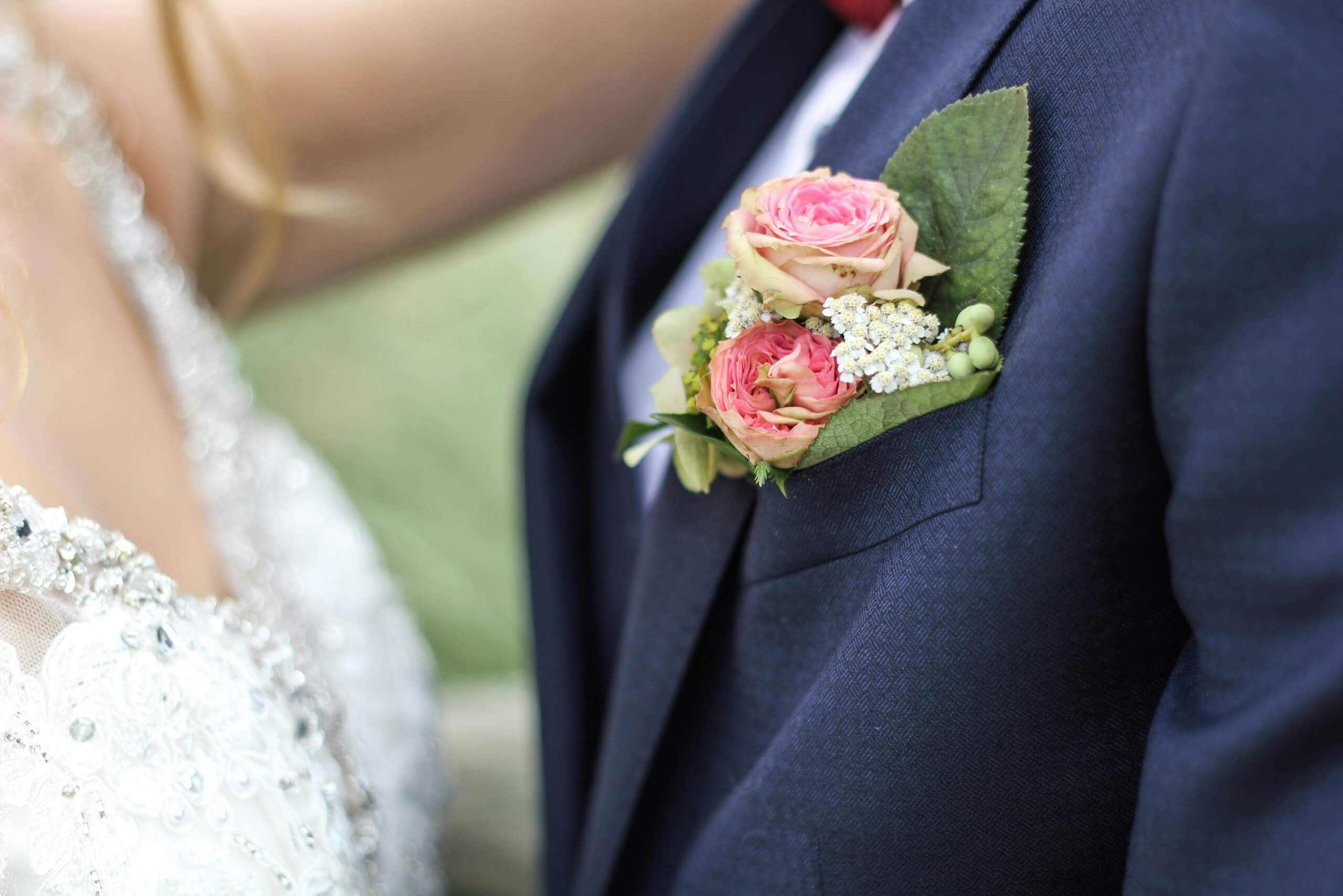 cohesive wedding look - groom boutenniere