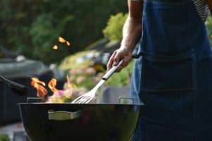 gifts for the grill master - man grilling