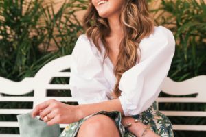 summer capsule wardrobe - woman in white top