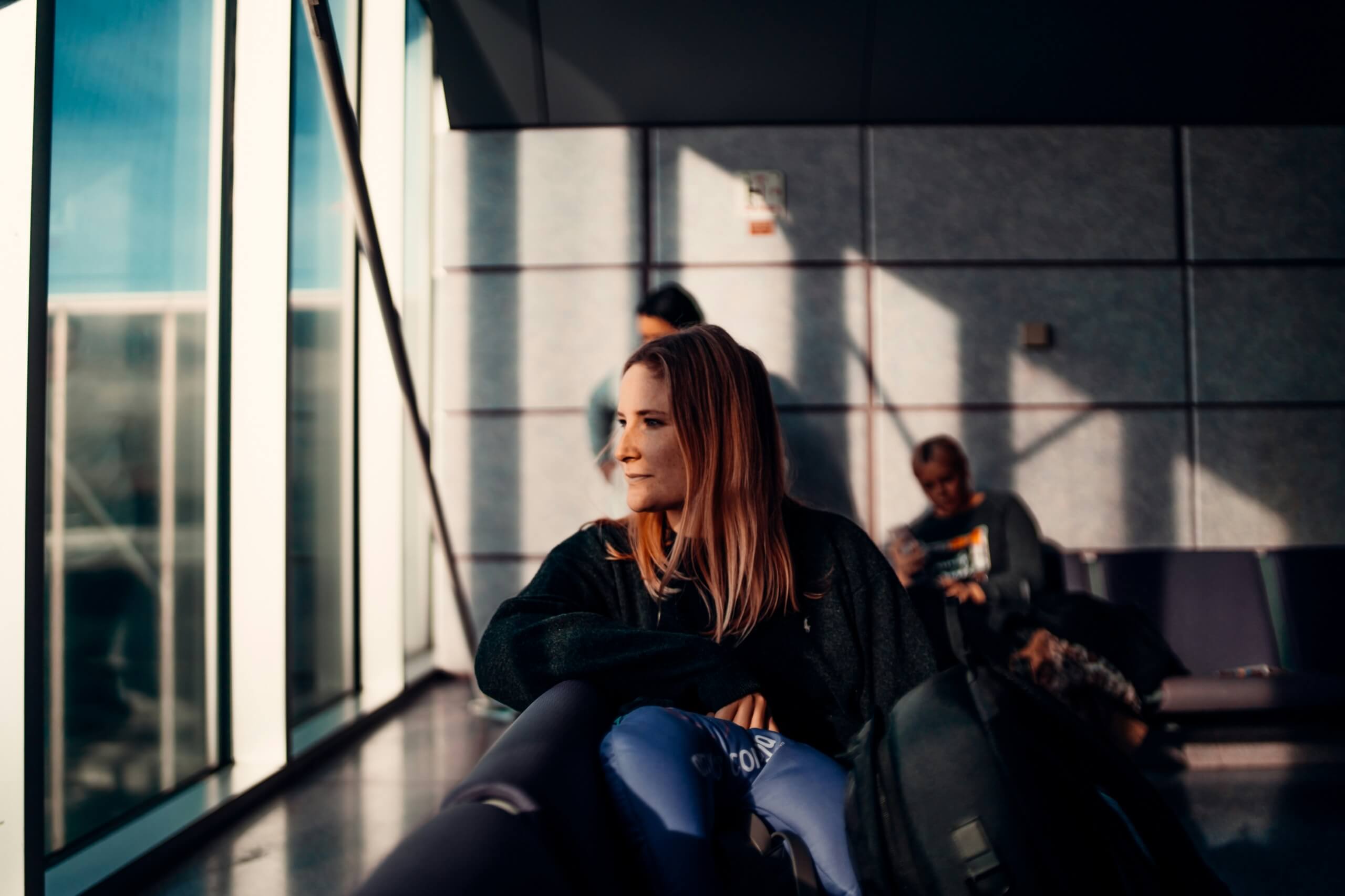 woman sitting at airport
