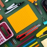 Classroom Supplies for Staff - school supplies on green background