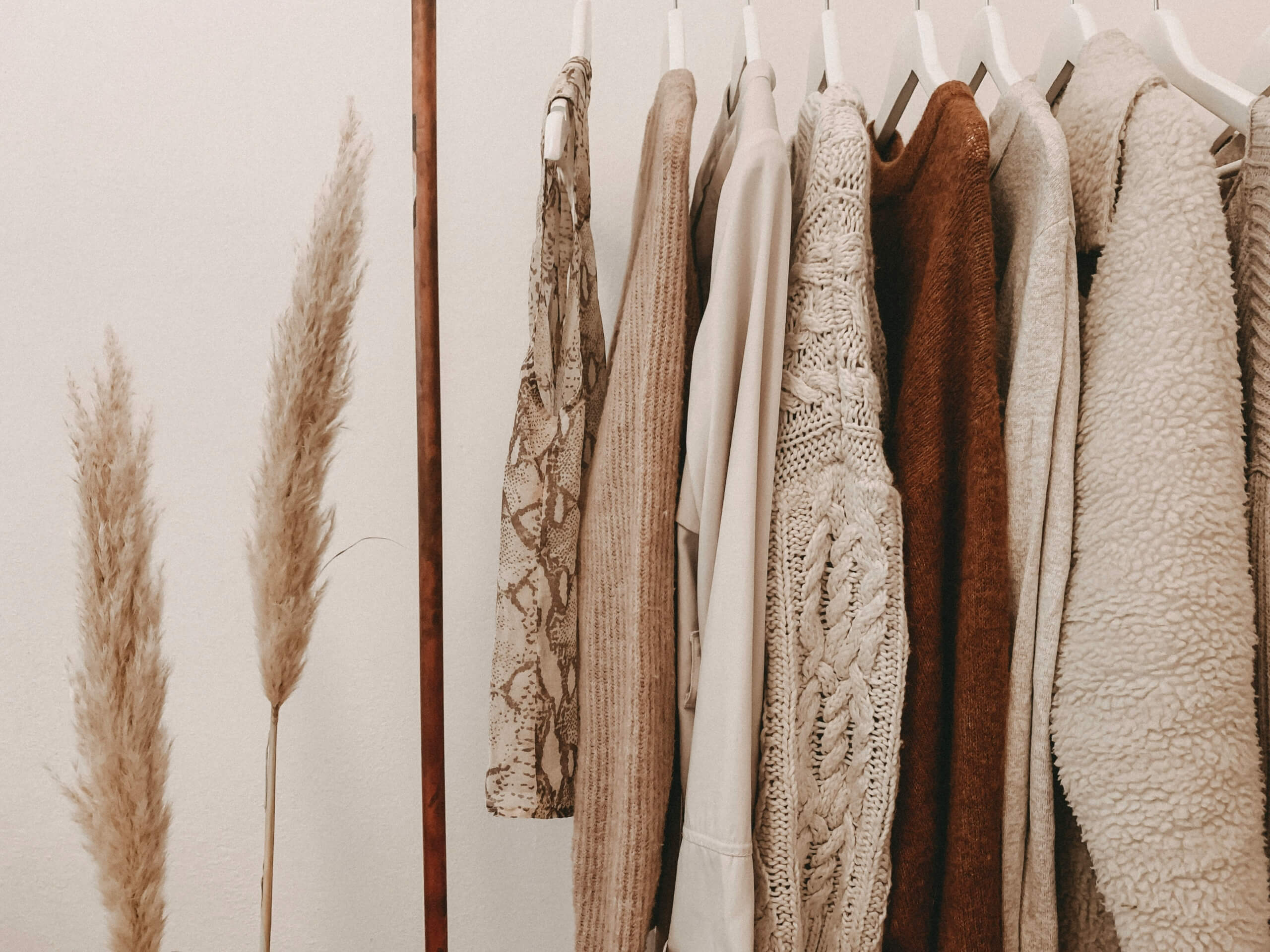 Capsule Wardrobe for Back-to-School - capsule wardrobe clothing hanging up