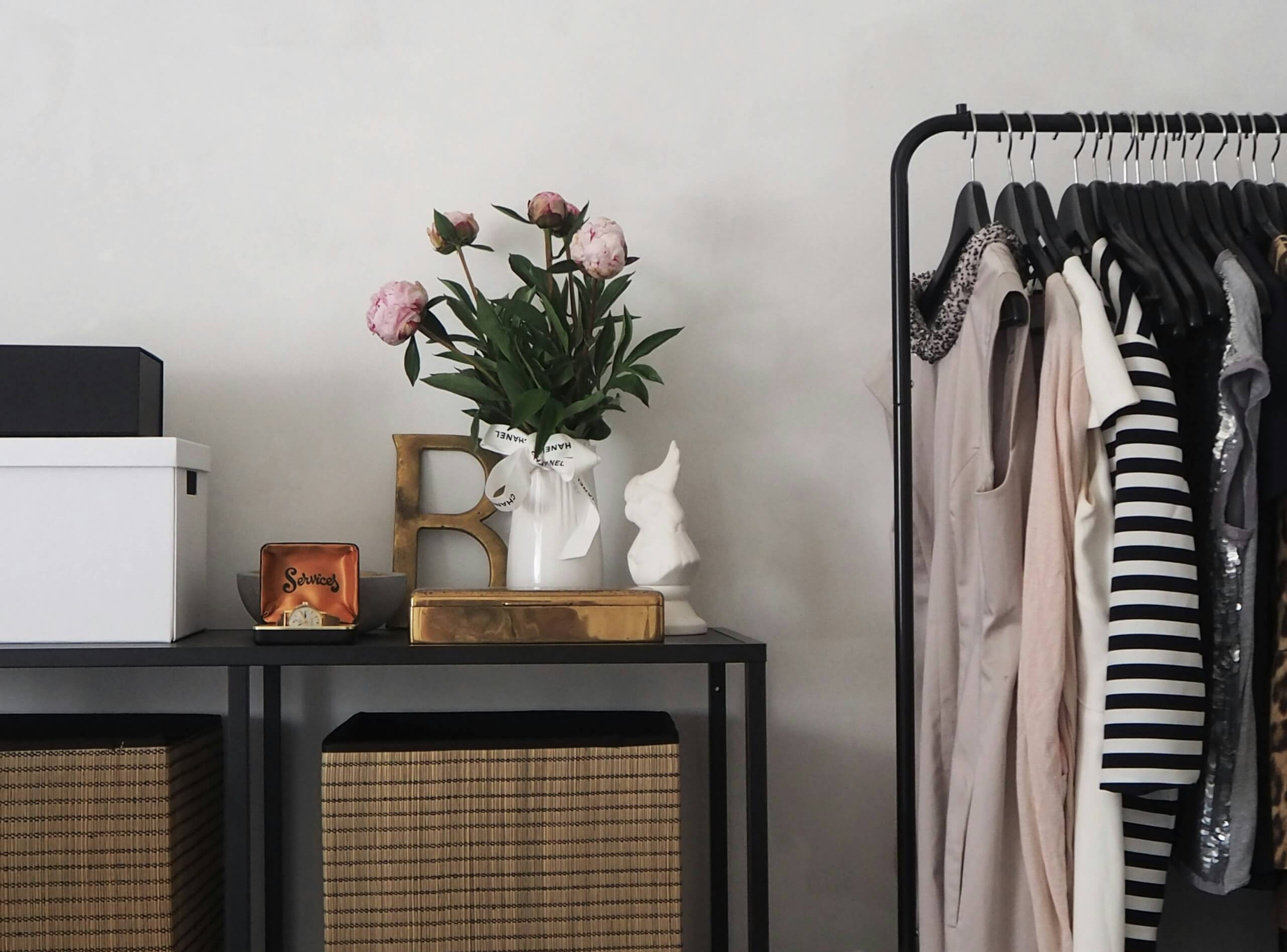 Capsule Wardrobe for Back-to-School - clothing hanging up